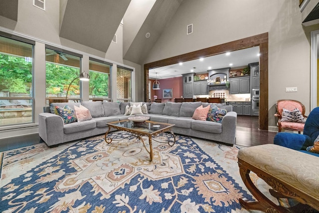 7736 Cross Rd, Tyler, TX 75703 - living room with dark wood-style flooring, high vaulted ceiling, and recessed lighting