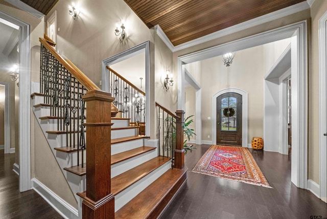 7736 Cross Rd, Tyler, TX 75703 - entrance foyer with wood finished floors, ornamental molding, stairway, and wood ceiling