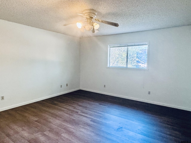 unfurnished room with a textured ceiling, dark hardwood / wood-style flooring, and ceiling fan