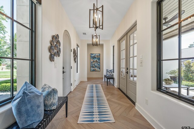 7612 Crosswater, Tyler, TX 75703 - foyer with a chandelier, baseboards, and french doors