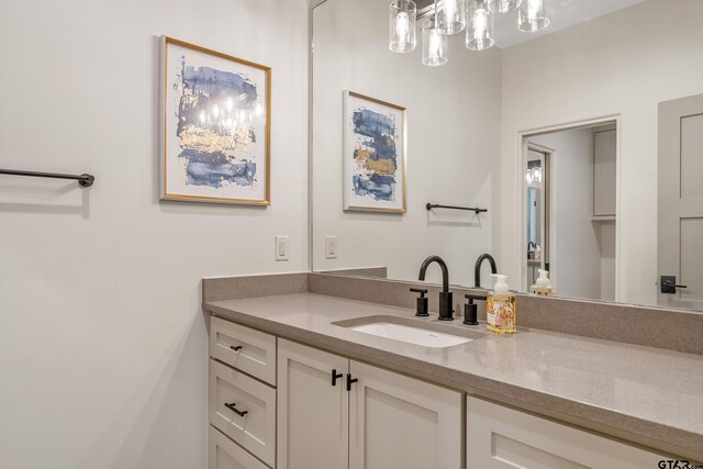7612 Crosswater, Tyler, TX 75703 - bathroom featuring vanity and a chandelier