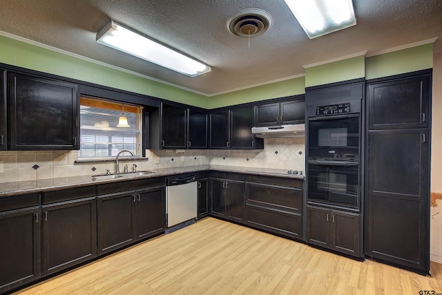 kitchen with light hardwood / wood-style floors, sink, dishwasher, and double oven