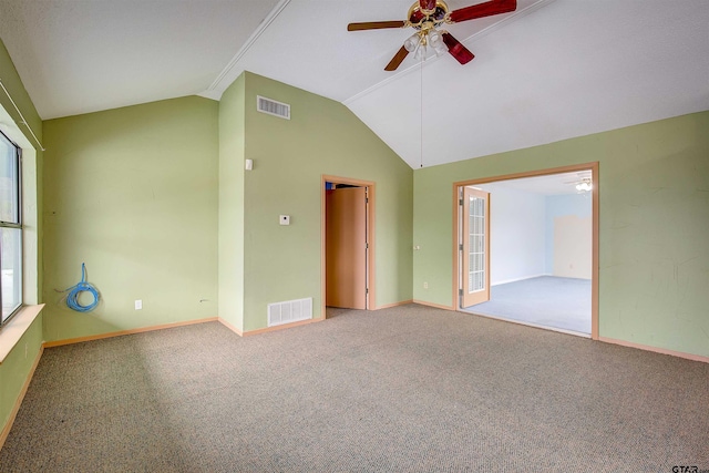 214 County Road 1900, Yantis, TX 75497 - carpeted empty room with a ceiling fan, vaulted ceiling, and baseboards