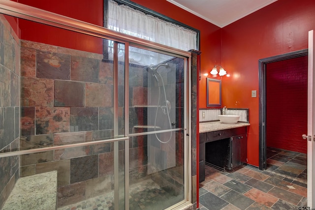 bathroom with walk in shower and vanity