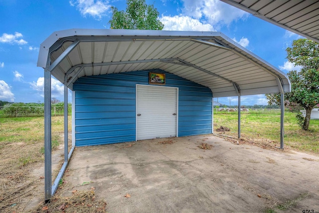 view of outbuilding with a carport