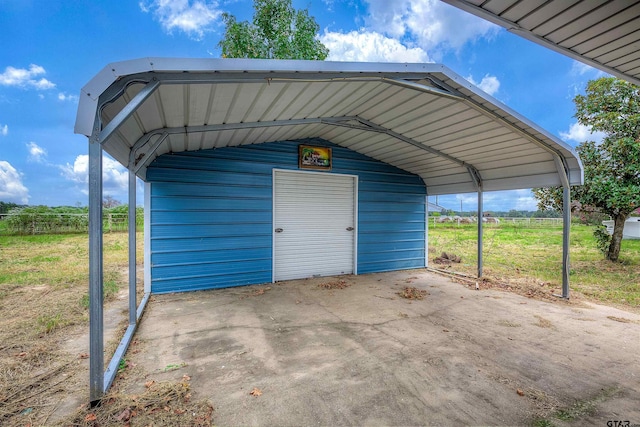 214 County Road 1900, Yantis, TX 75497 - view of parking / parking lot with a detached garage