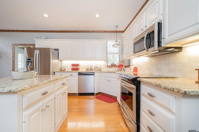 207 S King Laurence Ct, Scroggins, TX 75480 - kitchen featuring appliances with stainless steel finishes, white cabinets, light wood finished floors, backsplash, and hanging light fixtures