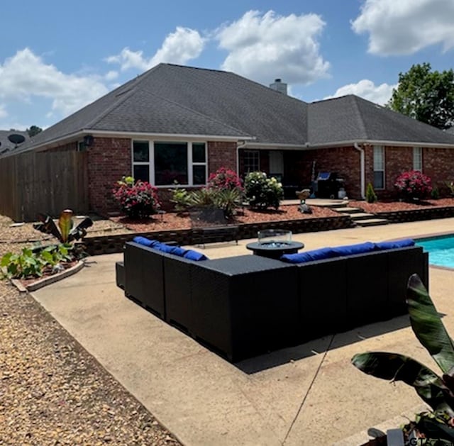 view of pool featuring fence, a fenced in pool, and a patio area