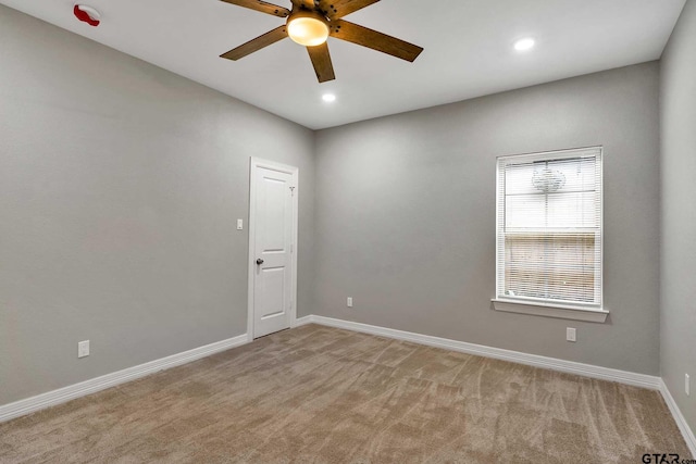 1608 N Englewood Ave, Tyler, TX 75702 - unfurnished room with ceiling fan, baseboards, light carpet, and recessed lighting