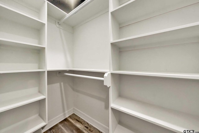 1608 N Englewood Ave, Tyler, TX 75702 - spacious closet featuring dark wood-style floors