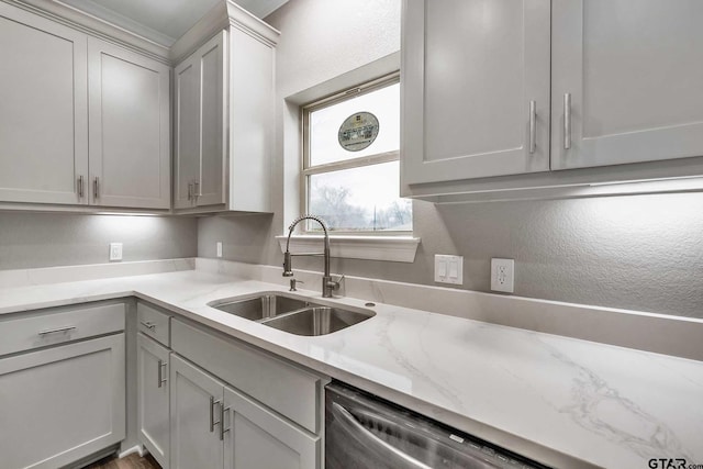 1608 N Englewood Ave, Tyler, TX 75702 - kitchen featuring a sink, light stone countertops, and stainless steel dishwasher