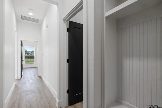 hallway with light wood-type flooring