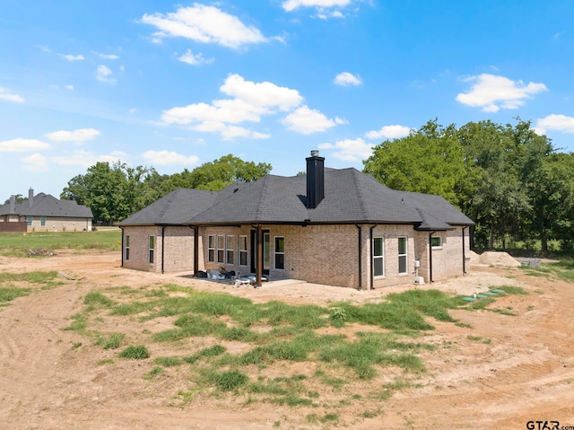 back of house featuring a patio area