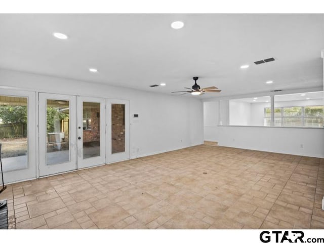 spare room with recessed lighting, french doors, plenty of natural light, and ceiling fan