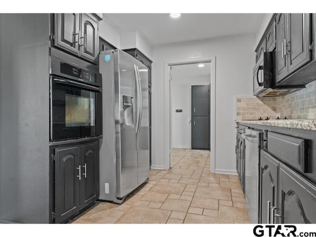 1812 Montrose Dr, Tyler, TX 75701 - kitchen featuring oven, stainless steel fridge, backsplash, recessed lighting, and stone tile floors