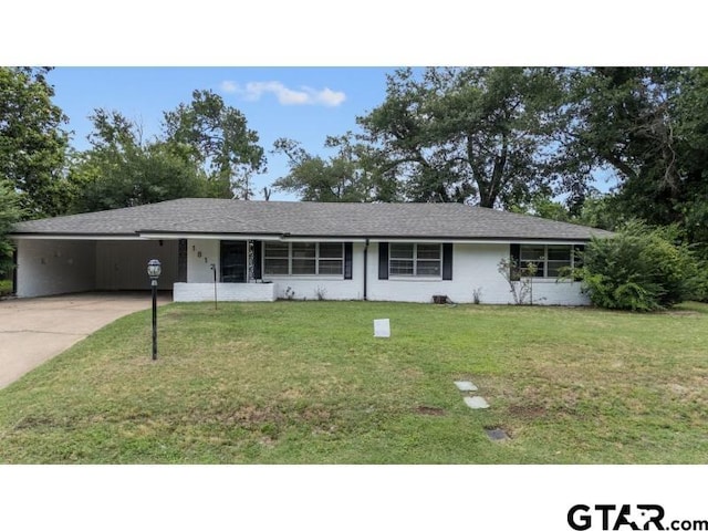 1812 Montrose Dr, Tyler, TX 75701 - single story home featuring driveway, a front lawn, and an attached carport