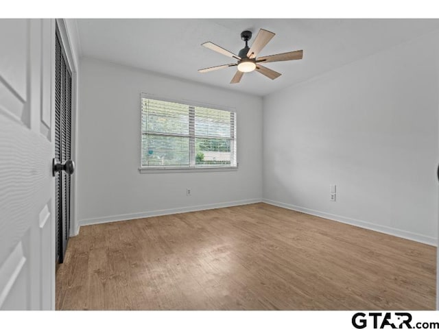 1812 Montrose Dr, Tyler, TX 75701 - unfurnished room featuring light wood-style flooring, ceiling fan, and baseboards