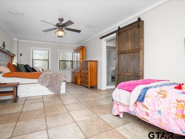 bedroom featuring ceiling fan, ornamental molding, and a barn door