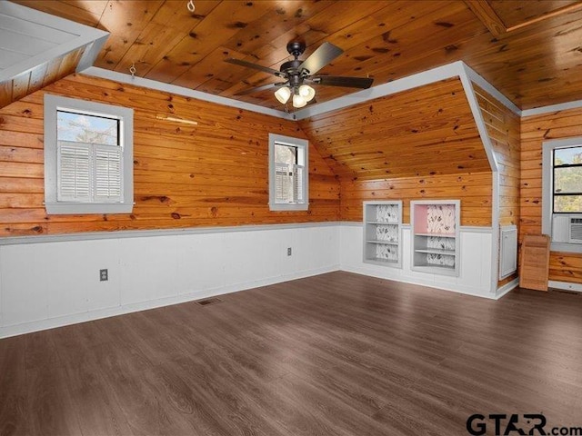 bonus room with wood ceiling, vaulted ceiling, dark hardwood / wood-style floors, and ceiling fan