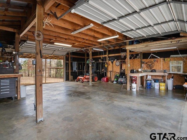 garage with a workshop area