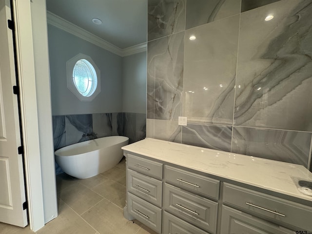 89 S Ryder Cup, Hideaway, TX 75771 - full bathroom with tile walls, ornamental molding, a freestanding bath, tile patterned floors, and vanity