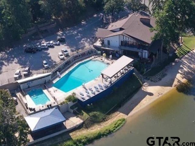 89 S Ryder Cup, Hideaway, TX 75771 - aerial view of property and surrounding area with a pool area
