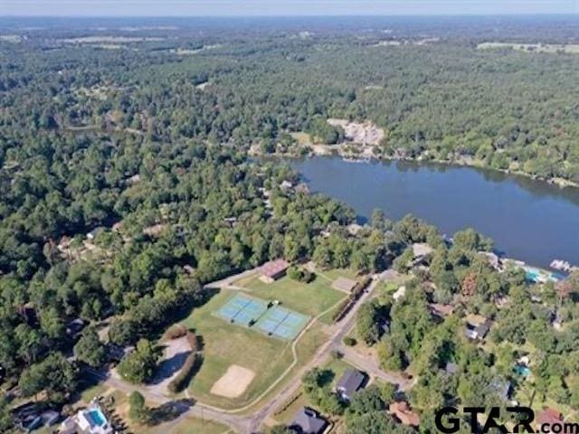 89 S Ryder Cup, Hideaway, TX 75771 - aerial view of property's location with a heavily wooded area and a nearby body of water