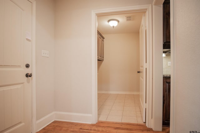 hallway featuring light hardwood / wood-style floors