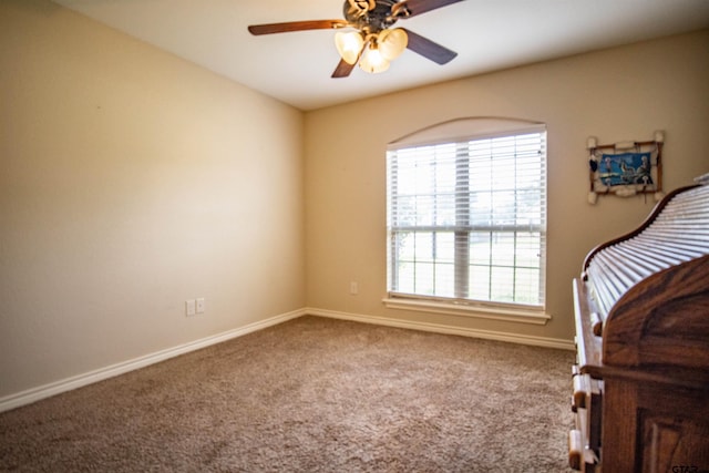 unfurnished bedroom featuring carpet floors and ceiling fan