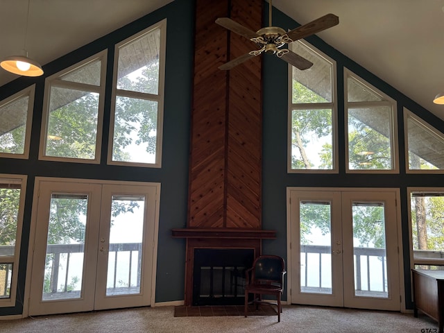 20868 Bay Shore Dr, Flint, TX 75762 - living area with french doors, carpet, plenty of natural light, a high ceiling, and ceiling fan