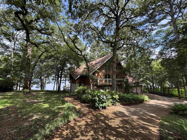 20868 Bay Shore Dr, Flint, TX 75762 - view of side of home featuring dirt driveway