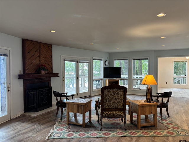 20868 Bay Shore Dr, Flint, TX 75762 - living room with light wood-type flooring, recessed lighting, and a large fireplace