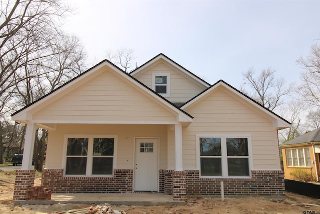 bungalow with brick siding