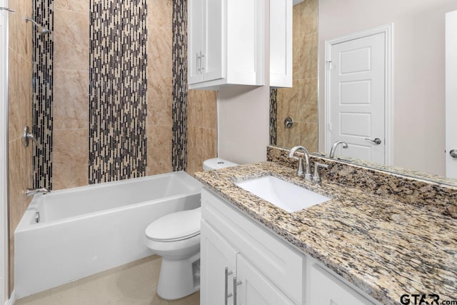 bathroom featuring toilet, vanity, and washtub / shower combination