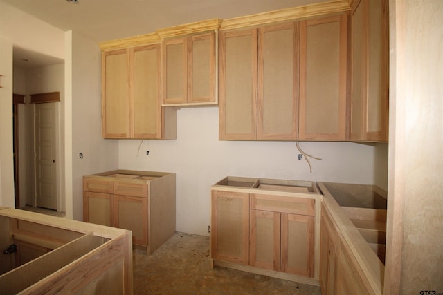 kitchen with light brown cabinetry