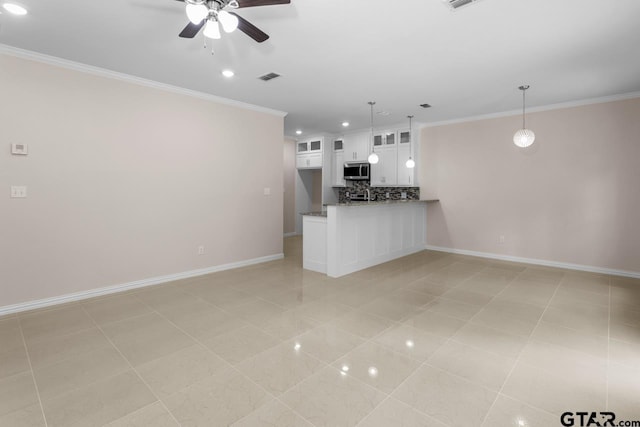 unfurnished living room featuring crown molding, light tile patterned floors, baseboards, and ceiling fan