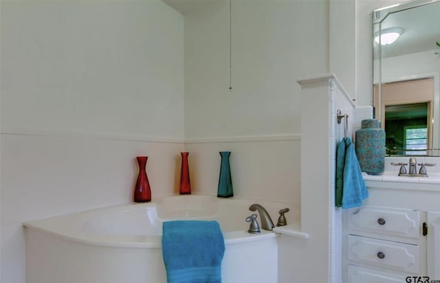 114 Mockingbird, Mount Pleasant, TX 75455 - bathroom featuring vanity and a garden tub