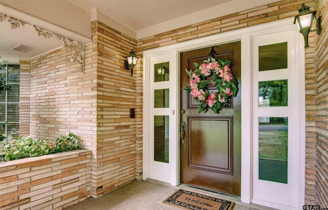 114 Mockingbird, Mount Pleasant, TX 75455 - entrance to property with brick siding and covered porch
