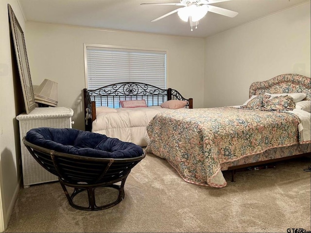 114 Mockingbird, Mount Pleasant, TX 75455 - bedroom with carpet floors, crown molding, and a ceiling fan