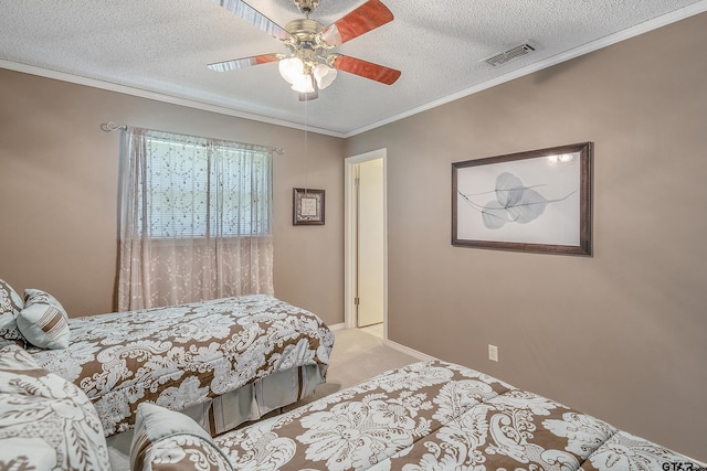 bedroom featuring a textured ceiling, ceiling fan, and crown molding