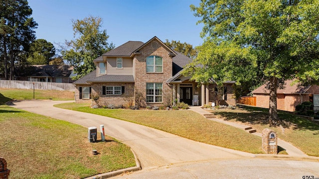 view of front of property with a front yard