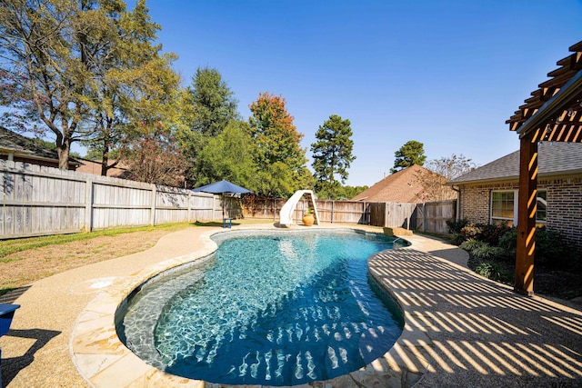 view of pool with a water slide