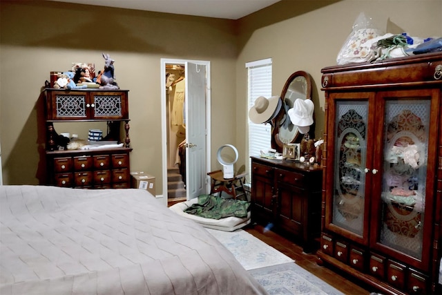 bedroom featuring wood-type flooring