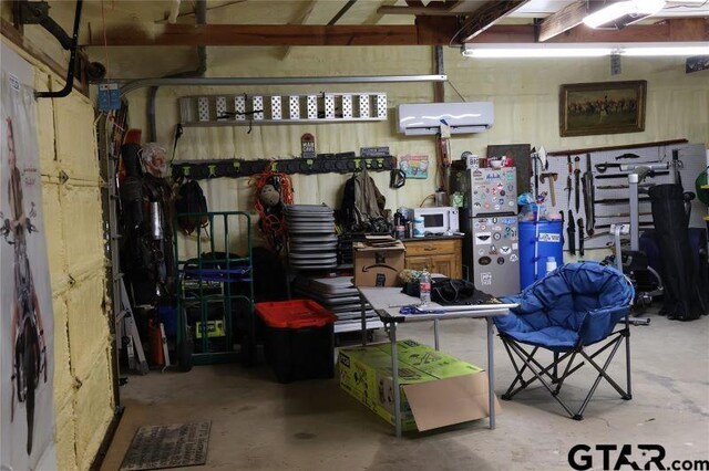 storage room with a wall mounted AC