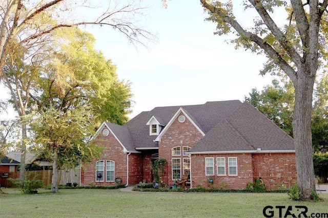 view of front of home with a front yard