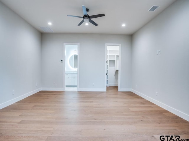2424 Bellview Cir, Tyler, TX 75709 - empty room featuring ceiling fan, recessed lighting, and light wood-style flooring