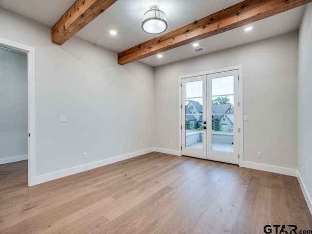 2424 Bellview Cir, Tyler, TX 75709 - empty room with french doors, beam ceiling, light wood-style floors, and recessed lighting