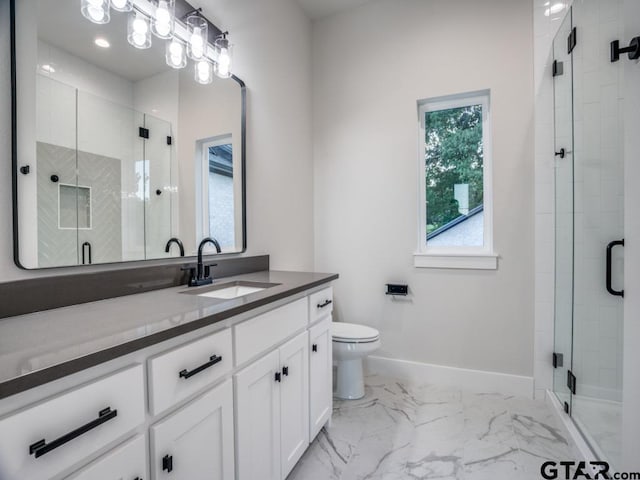 2424 Bellview Cir, Tyler, TX 75709 - bathroom featuring vanity, marble finish flooring, and a stall shower