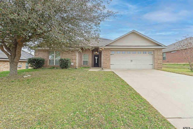 single story home featuring a garage and a front yard