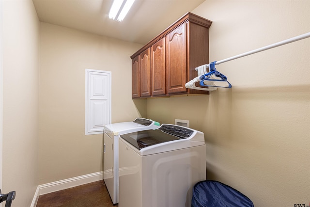 laundry room with cabinets and separate washer and dryer